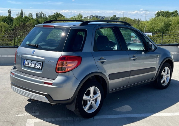 Suzuki SX4 cena 13900 przebieg: 263341, rok produkcji 2009 z Wrocław małe 92